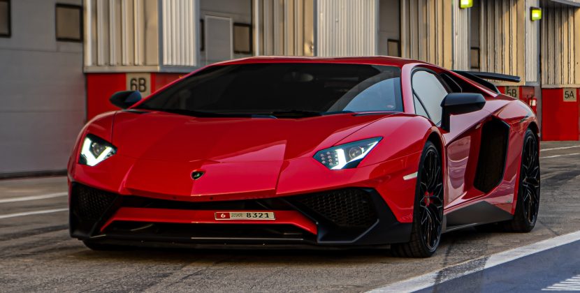 Supercar Clash: Lamborghini and McLaren Create Traffic Jam at Tesla Supercharger, Fueling EV vs. ICE Debate!
