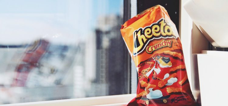 Behind the Flames: Exploring the Truths That Hot Cheetos ‘Flamin’ Hot’ Doesn’t Tell You